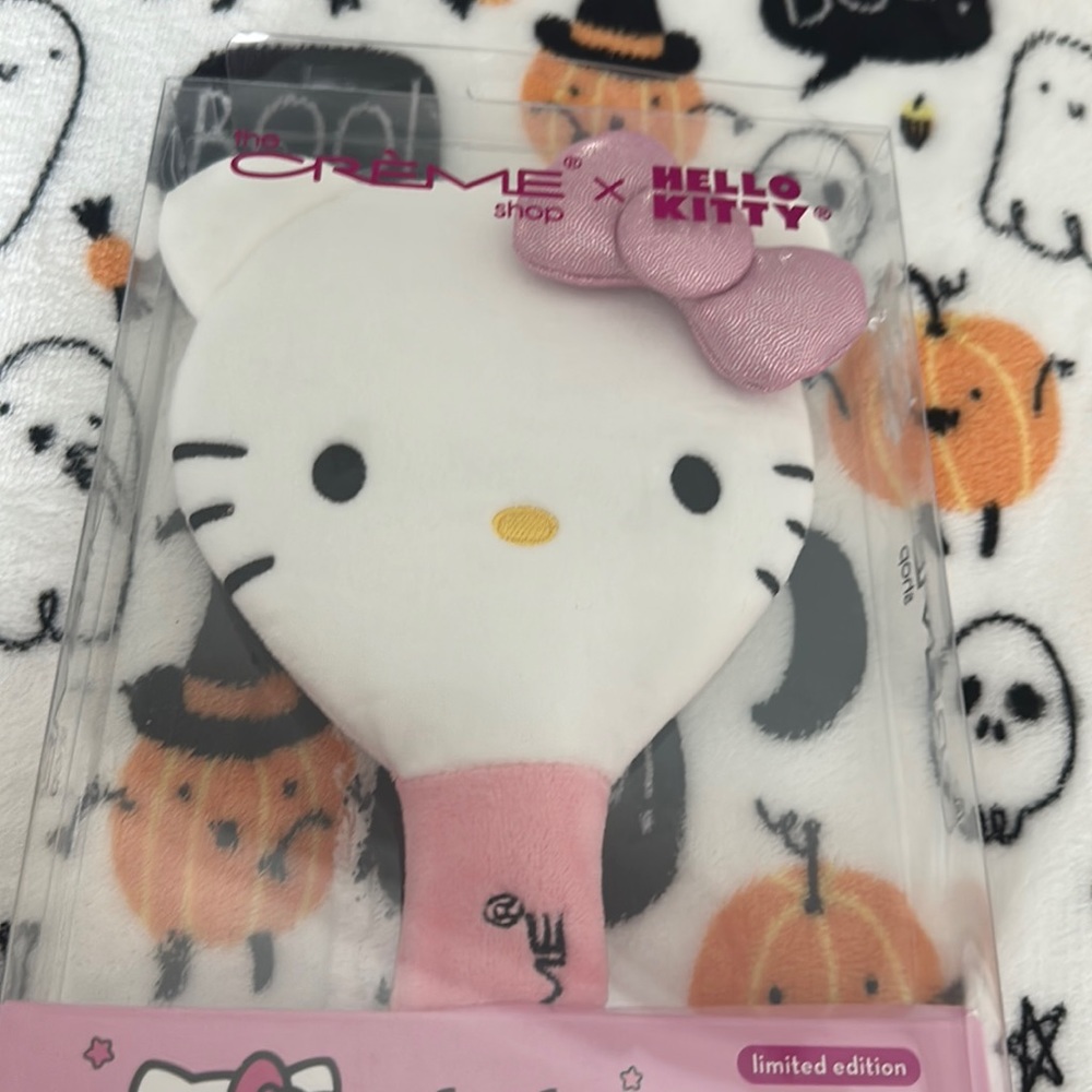 New band hello kitty mirror pink